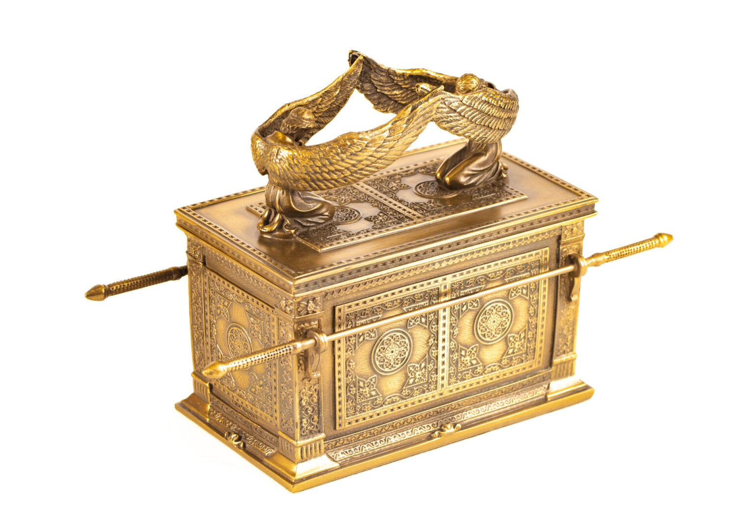 A gold colored box with a handle on top of it.